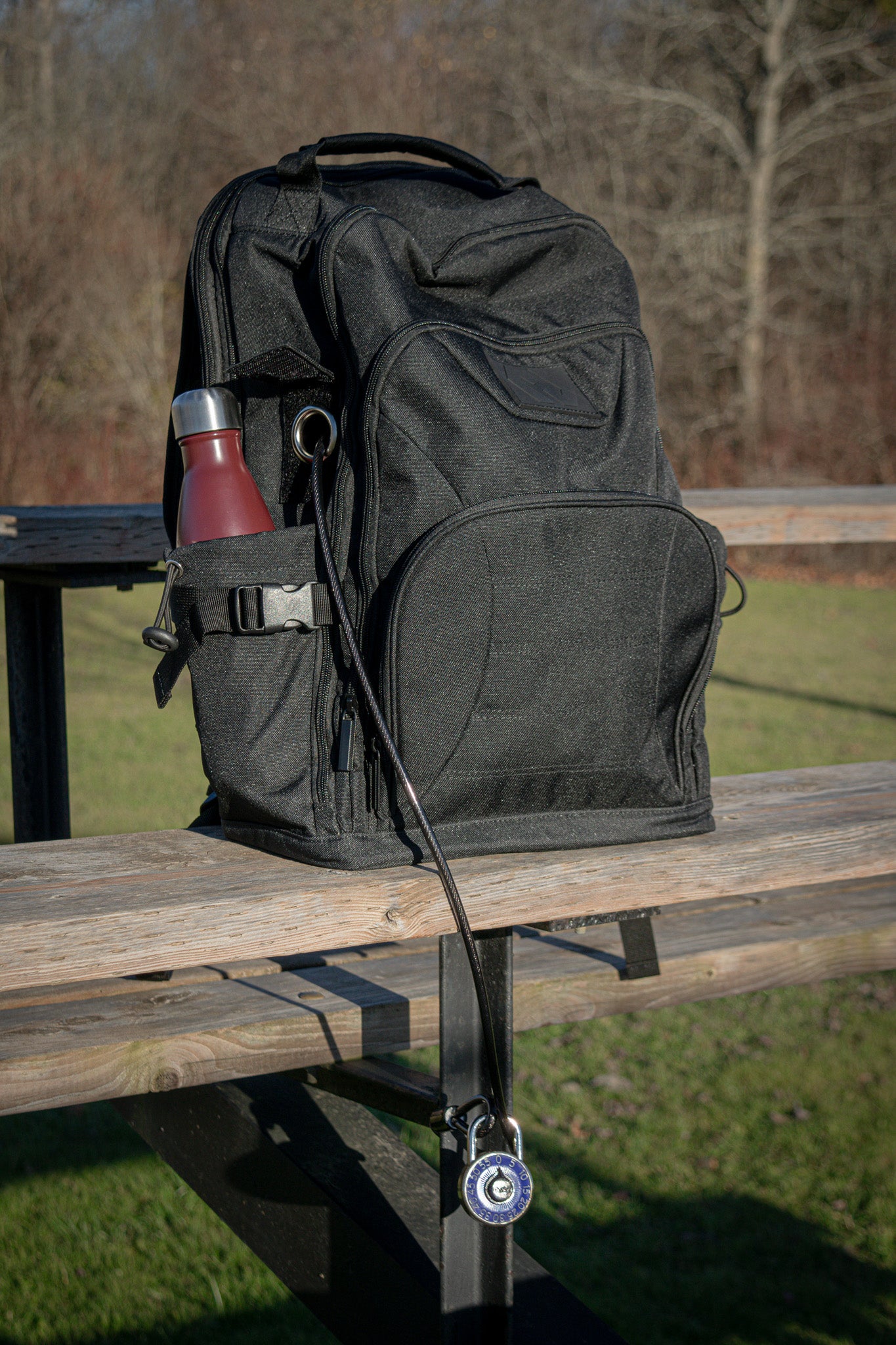 The Havlar backpack locked to baseball stands.